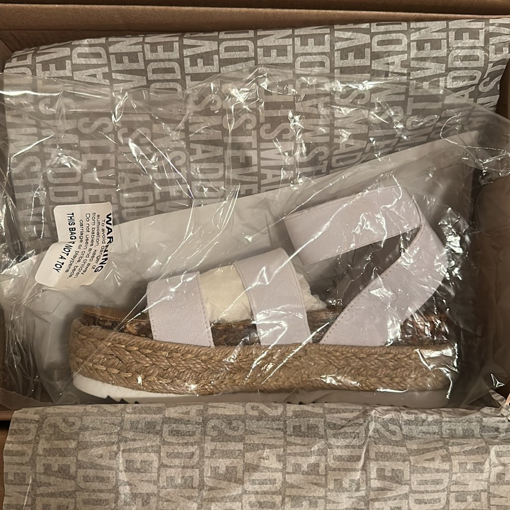 white Steve Madden sandals
